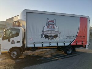Truck Vinyl branding and tarp
